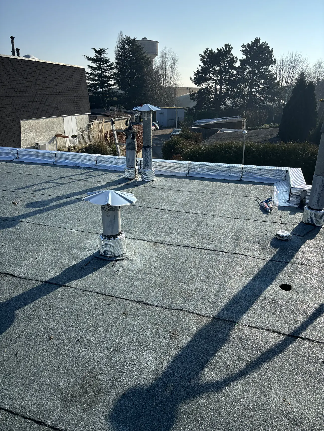 Étanchéité de toit-terrasse — Toiture zinc
