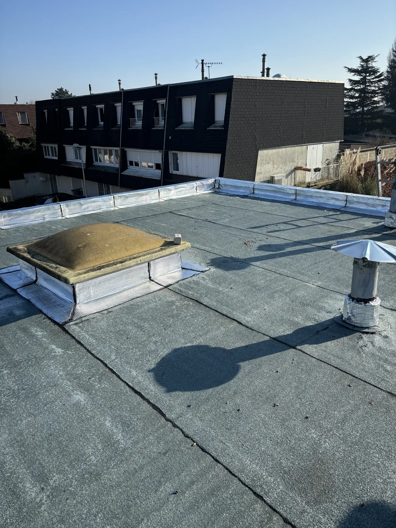 Toit-terrasse en étanchéité — Toiture zinc